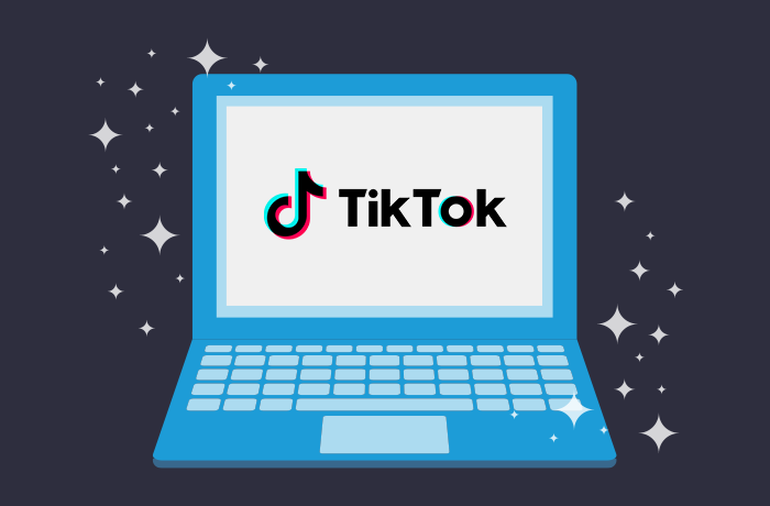 蓝笔记本电脑图文深蓝背景图文上贴有TikTok标识